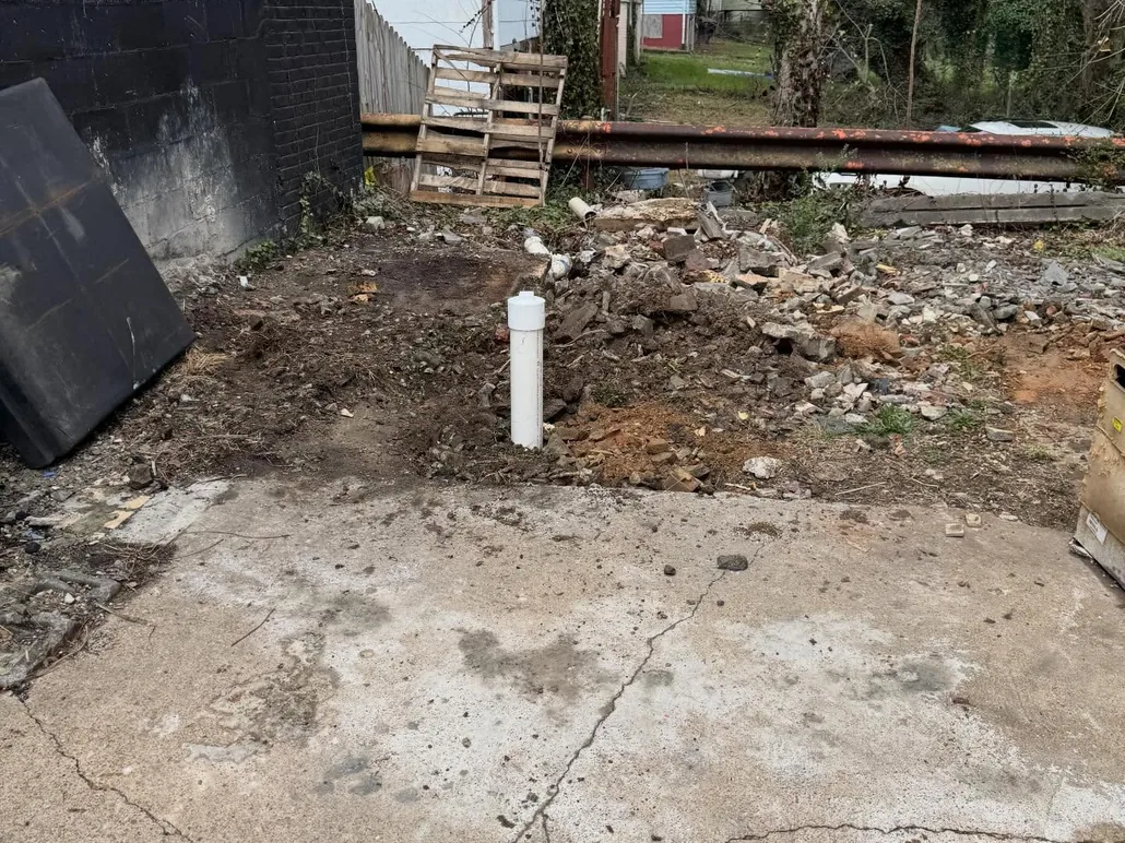 Sewer cleanout pipe in a backfilled yard, hydro jetting