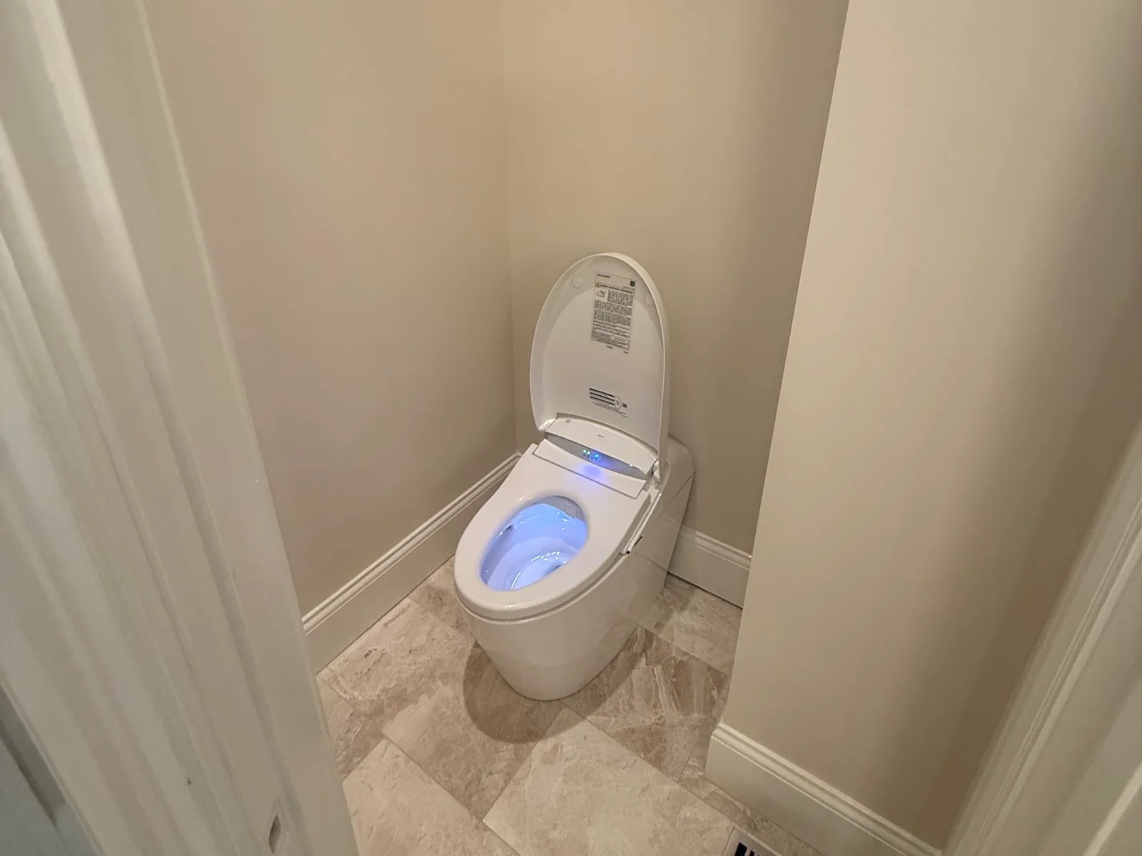 New smart toilet installed in a toilet room, toilet repair and installation